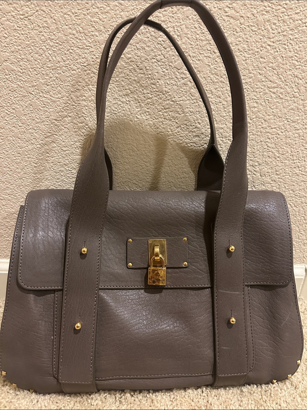 Marc Jacobs Taupe Stanton Leather Top-Handle Satchel with Gold Hardware.